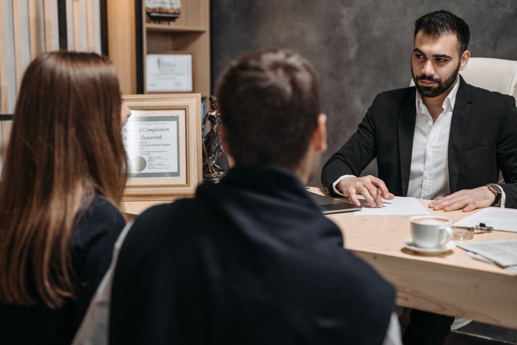 Lawyer meeting clients in office